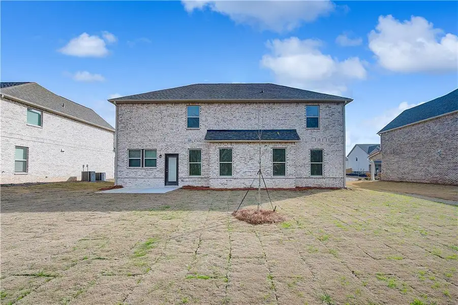 Exterior details and patio area of a home in Adagio, Dacula (Image 17).