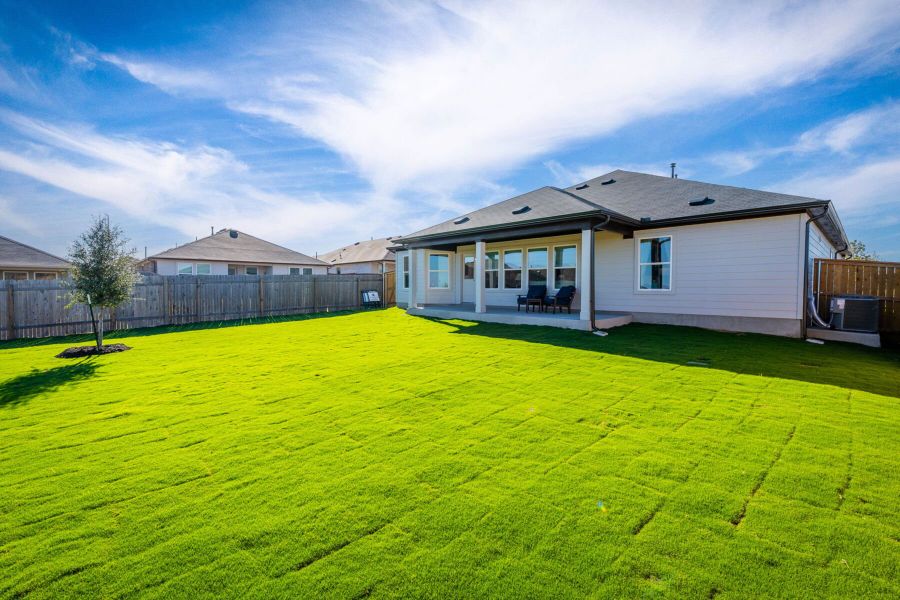 This is the back exterior of the Hawkins plan and is the model home in Carillon at 13305 Eppright Trace Blvd., Manor, TX. This is the back exterior of the Hawkins plan and is the model home in Carillon at 13305 Eppright Trace Blvd., Manor, TX.