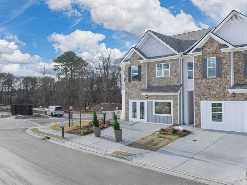 Front exterior of a new home in Greyton Springs Place, Buford, GA, highlighting curb appeal (Image 23).