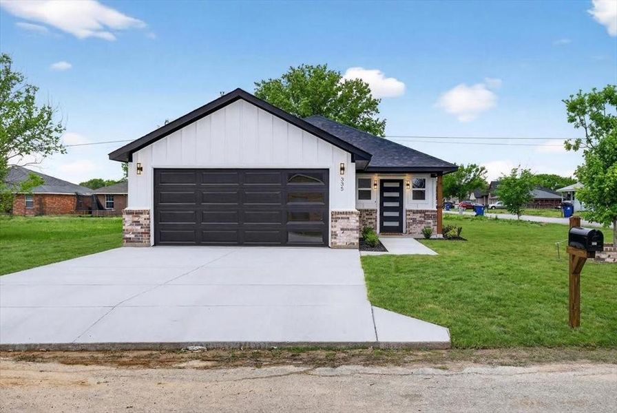 Front exterior of a new home in , Gun Barrel City, TX, highlighting curb appeal (Image 2). Front exterior of a new home in , Gun Barrel City, TX, highlighting curb appeal (Image 2).