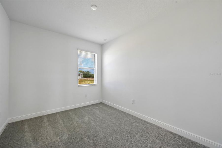 Spacious, unfurnished interior of a new home in Grand Park, Sarasota (Image 25).