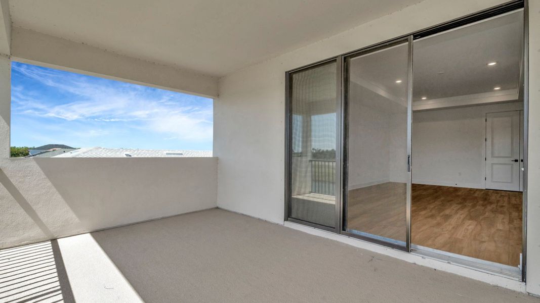 The Balcony of a DRB Homes Grand Hawk which is offered as a home plan at Serengeti in Spring Hill, FL.