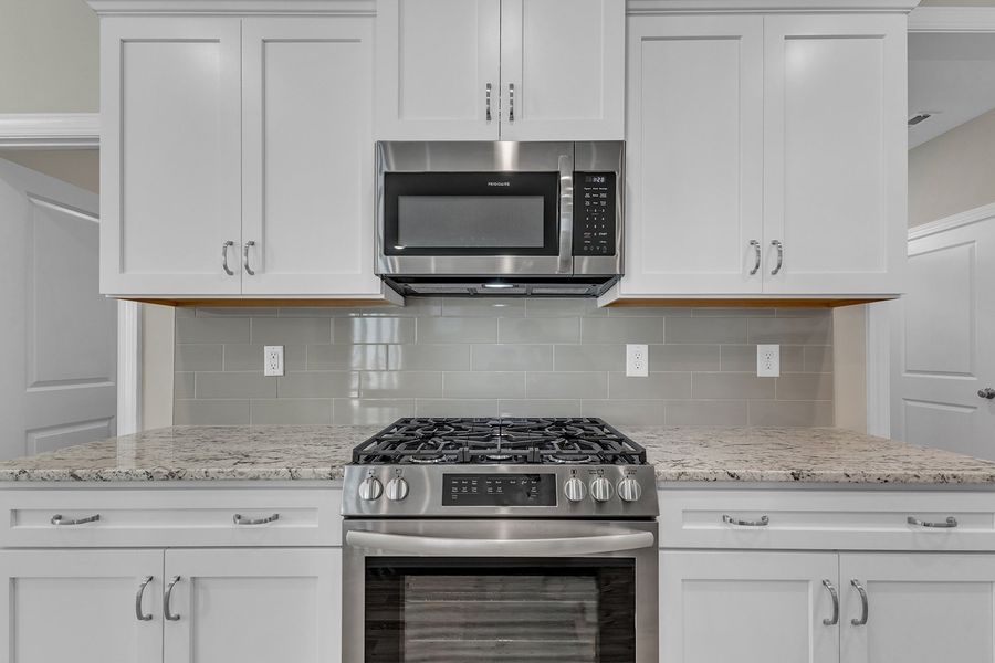 Representative furnished interior of a home built from the The Whitley by RobuckHomes in Windwater, Hampstead (Image 14).