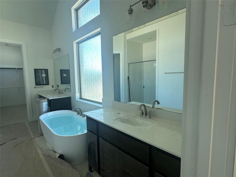 Primary Bath retreat with dual vanities and soaking tub