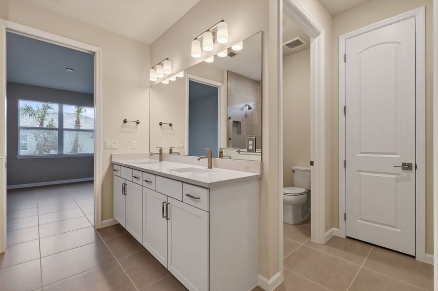 Furnished interior view inside a new home in Del Webb Tradition, Port St. Lucie (Image 13).
