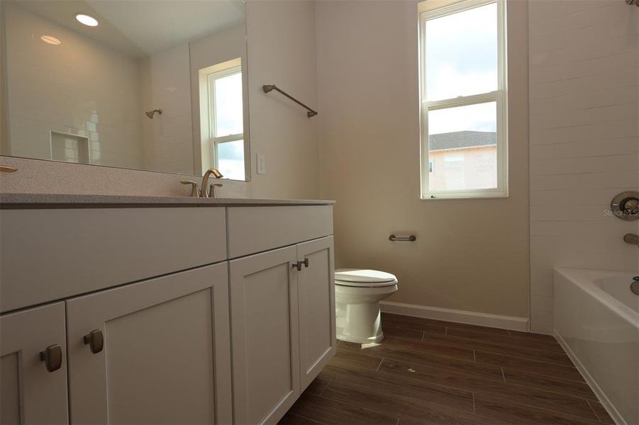 Furnished interior view inside a new home in Lake Star at Ovation, Winter Garden (Image 16).