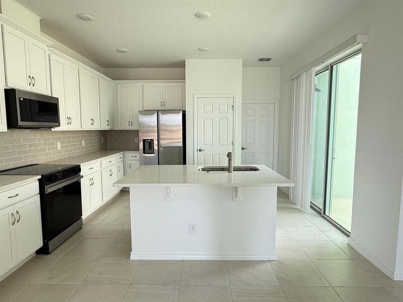 Furnished interior view inside a new home in Cypress Bluff, Groveland (Image 3).