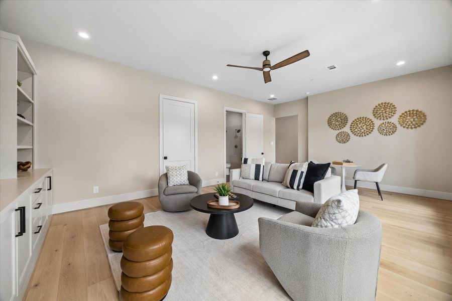 Another view of the second-floor game room shows the built-in storage, generous open space, and easy connection to the surrounding bedrooms and bath. Another view of the second-floor game room shows the built-in storage, generous open space, and easy connection to the surrounding bedrooms and bath.