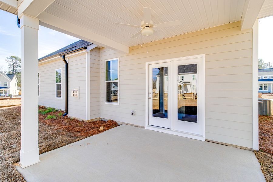 Exterior details and patio area of a home in Pebble Branch, Chapin (Image 3).