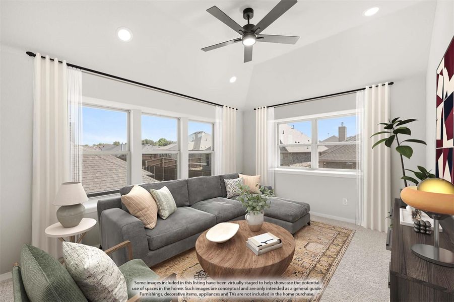 Living room with vaulted ceiling, ceiling fan, gray sectional sofa, and large windows with neighborhood views Living room with vaulted ceiling, ceiling fan, gray sectional sofa, and large windows with neighborhood views