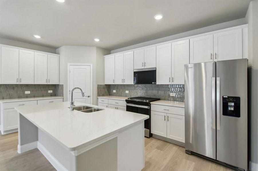 Photo is not of the actual home, but is an inspirational photo of builder’s model home and may depict options, furnishings, and/or decorator features that are not included.