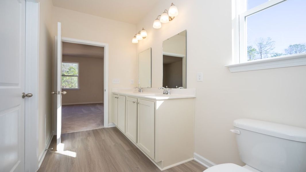 Representative furnished interior of a home built from the KERRY by D.R. Horton in The Reserve at Wild Horse, Conway (Image 14).