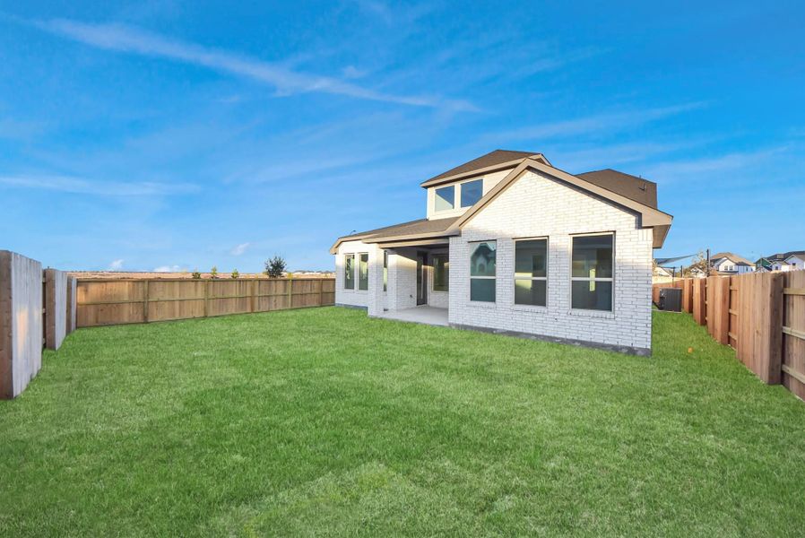 Exterior details and patio area of a home in Elyson, Katy (Image 16).