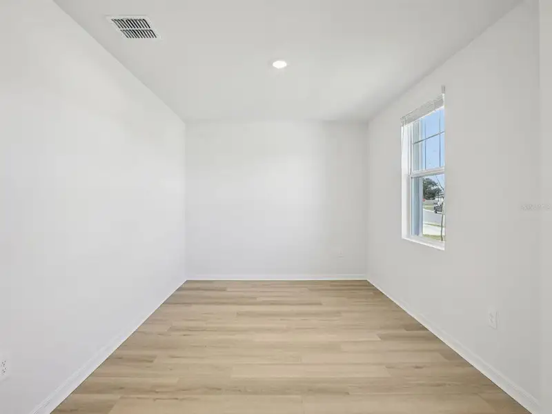 Spacious, unfurnished interior of a new home in Magnolia Bay - Classic Series, Nokomis (Image 12).