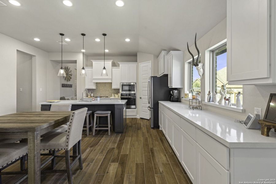 Furnished interior view inside a new home in The Village of Mill Creek 50', Seguin (Image 5).