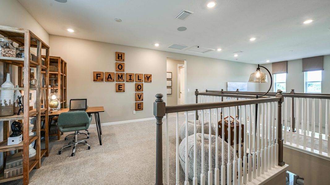 Furnished interior view inside a new home in Veranda Oaks, Fort Pierce (Image 9).