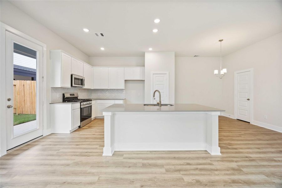 Furnished interior view inside a new home in Alicante, Houston (Image 3).