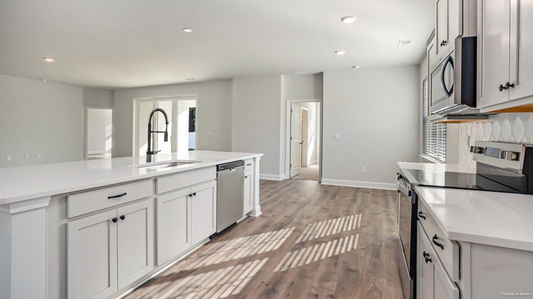 Furnished interior view inside a new home in Merchant Point, Jacksonville (Image 9).