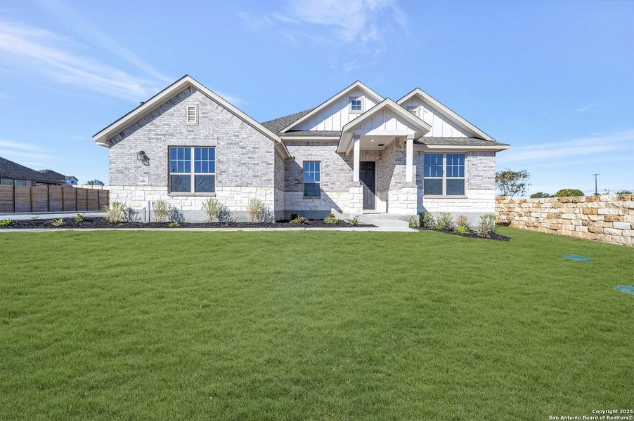 Front exterior of a new home in Everly Estates, San Antonio, TX, highlighting curb appeal (Image 1). Front exterior of a new home in Everly Estates, San Antonio, TX, highlighting curb appeal (Image 1).