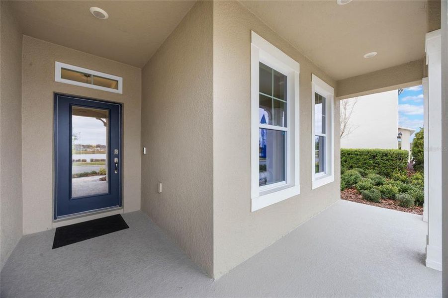 Exterior details and patio area of a home in Archers Mill, Ormond Beach (Image 2).