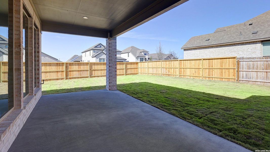 Exterior details and patio area of a home in Alsatian Oaks, Castroville (Image 4).