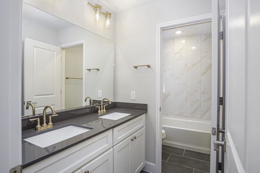 Representative furnished interior of a home built from the The Osbourne by Rosehaven Homes in Magnolia Village, San Antonio (Image 9).