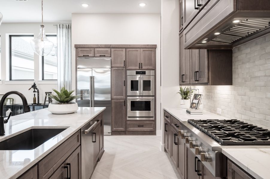 Representative furnished interior of a home built from the Carignan by Tri Pointe Homes in Sienna 80′, Missouri City (Image 9).