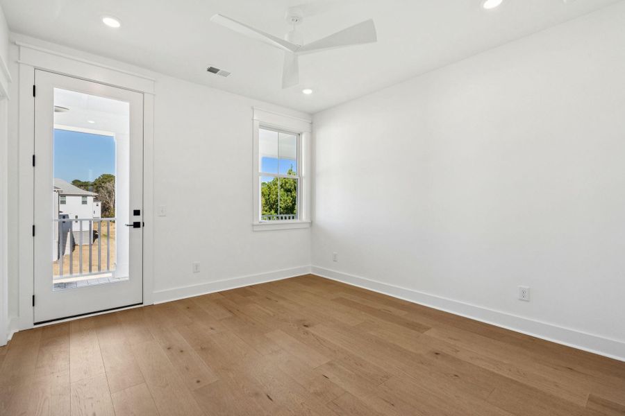 Spacious, unfurnished interior of a new home in Overlook at Copahee Sound, Awendaw (Image 62).