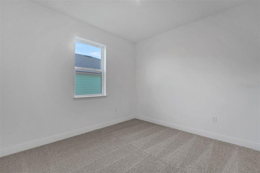 Spacious, unfurnished interior of a new home in Green Key Village, Lady Lake (Image 33).