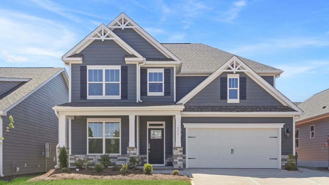 Front exterior of a new home in Whitehawk Meadows, Travelers Rest, SC, highlighting curb appeal (Image 1). Front exterior of a new home in Whitehawk Meadows, Travelers Rest, SC, highlighting curb appeal (Image 1).