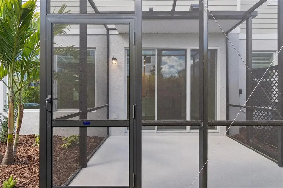 Exterior details and patio area of a home in , Parrish (Image 3).