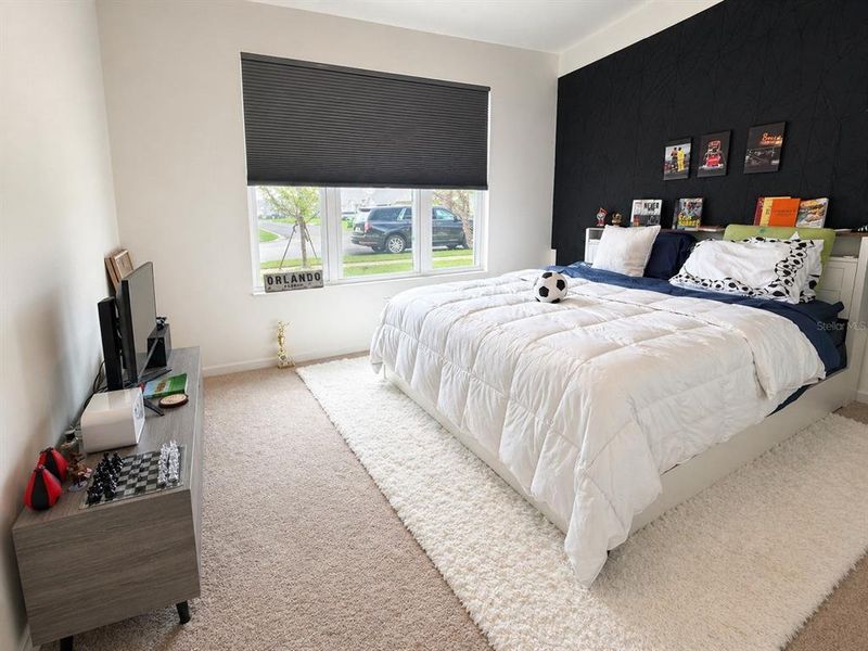 Furnished interior view inside a new home in Crystal Bay Estates, Grant-Valkaria (Image 15).