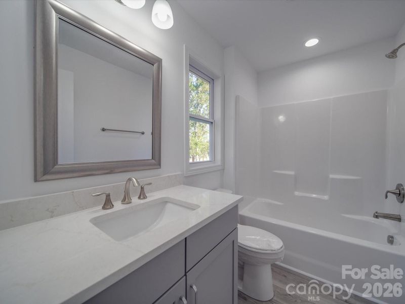 Furnished interior view inside a new home in , Belmont (Image 8).