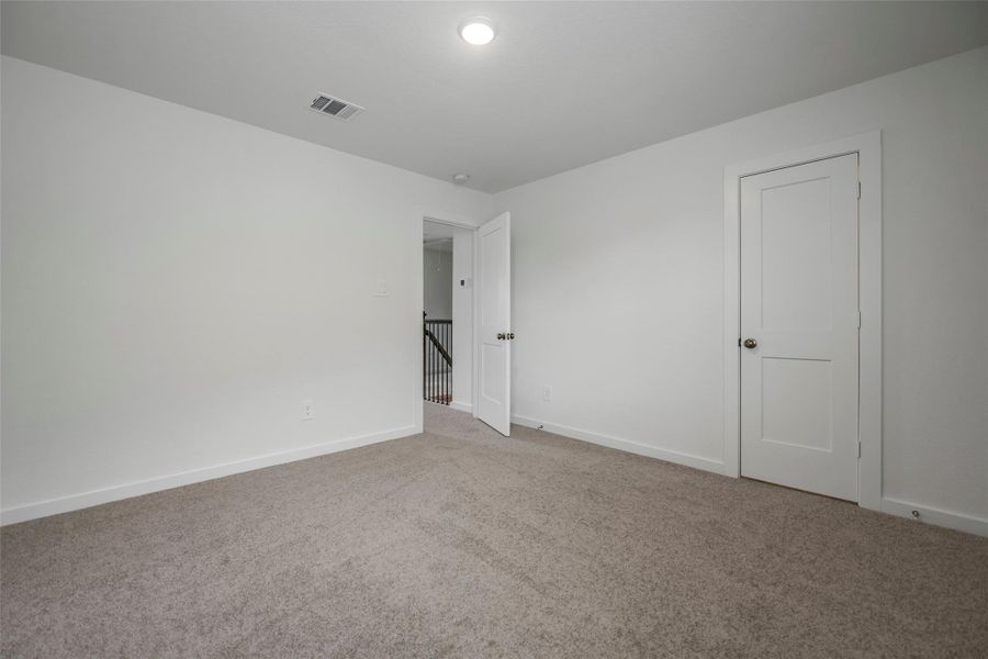 Spacious, unfurnished interior of a new home in Sorella, Tomball (Image 22).