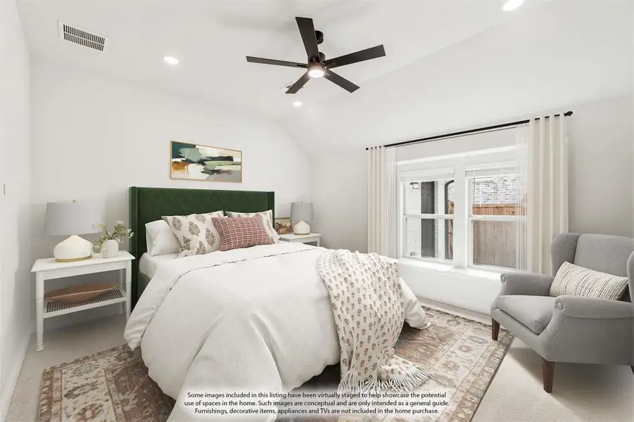 Bedroom with vaulted ceiling, ceiling fan, green upholstered headboard, and large window with white curtains