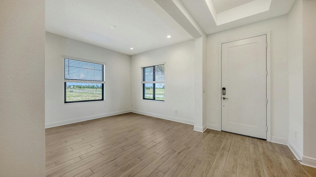 Spacious, unfurnished interior of a new home in Palm Grove Real Estate and Homes for Sale in Lakewood Ranch, FL - Neal Communities, Lakewood Ranch (Image 25).
