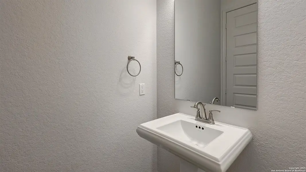 Furnished interior view inside a new home in Kallison Ranch 60', San Antonio (Image 4).