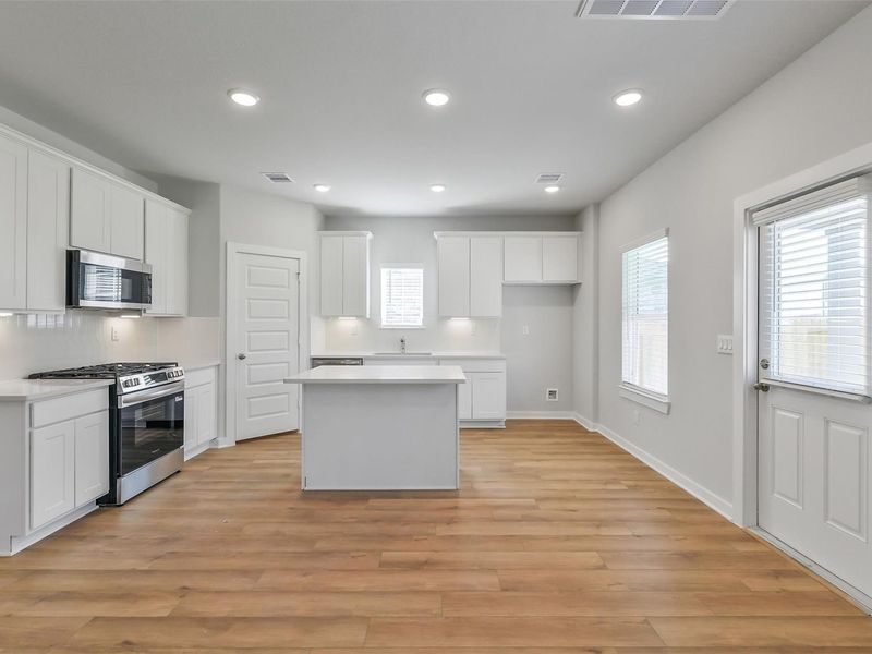 Furnished interior view inside a new home in Lakes at Black Oak, Magnolia (Image 14).