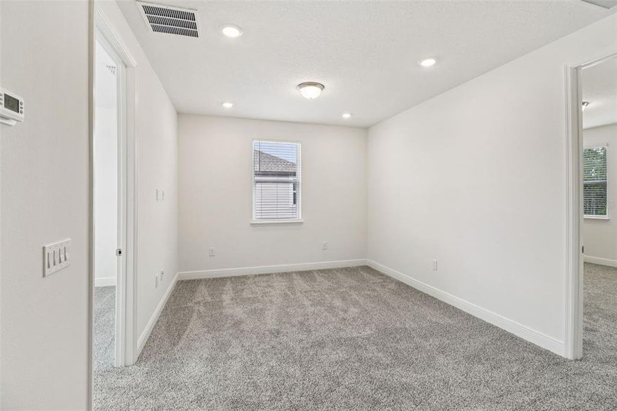 Spacious, unfurnished interior of a new home in Legends Preserve - Signature Series, Daytona Beach (Image 37).