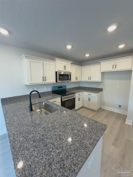 Furnished interior view inside a new home in Allison Acres, Cantonment (Image 6).