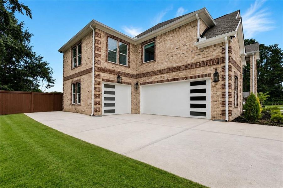 Front exterior of a new home in , Norcross, GA, highlighting curb appeal (Image 2). Front exterior of a new home in , Norcross, GA, highlighting curb appeal (Image 2).