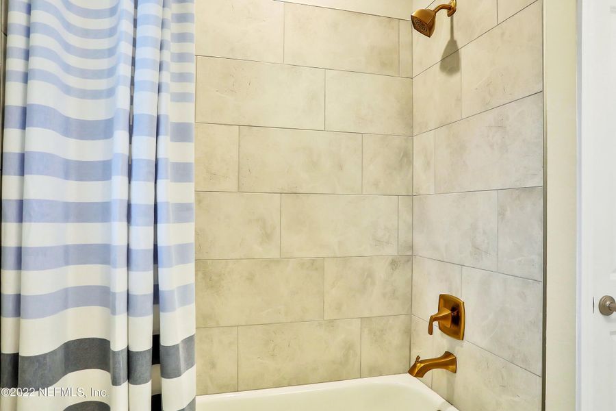 Furnished interior view inside a new home in Silver Landing at SilverLeaf, St. Augustine (Image 38).