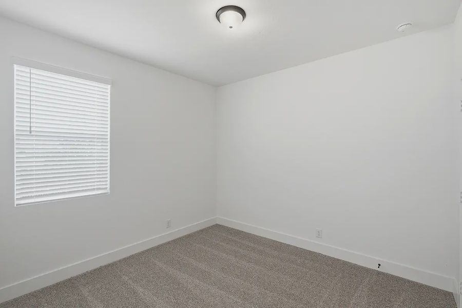 Representative unfurnished interior of a home built from the Athena by Chesmar Homes in Prominence Urban, San Antonio (Image 39).