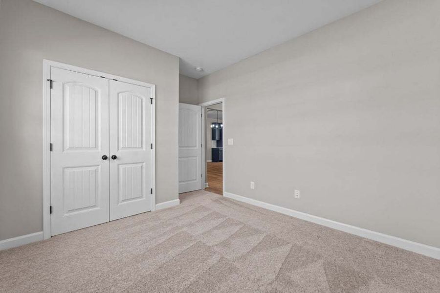 Representative unfurnished interior of a home built from the Weymouth by Caviness & Cates Communities in Bartlett Manor, Youngsville (Image 42).