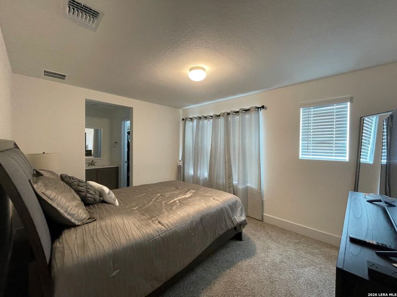 Furnished interior view inside a new home in Hunters Ranch, San Antonio (Image 10).