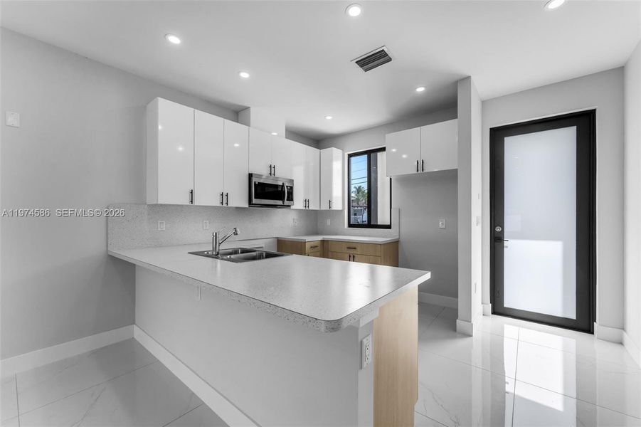 Furnished interior view inside a new home in , Miami (Image 3). Furnished interior view inside a new home in , Miami (Image 3).