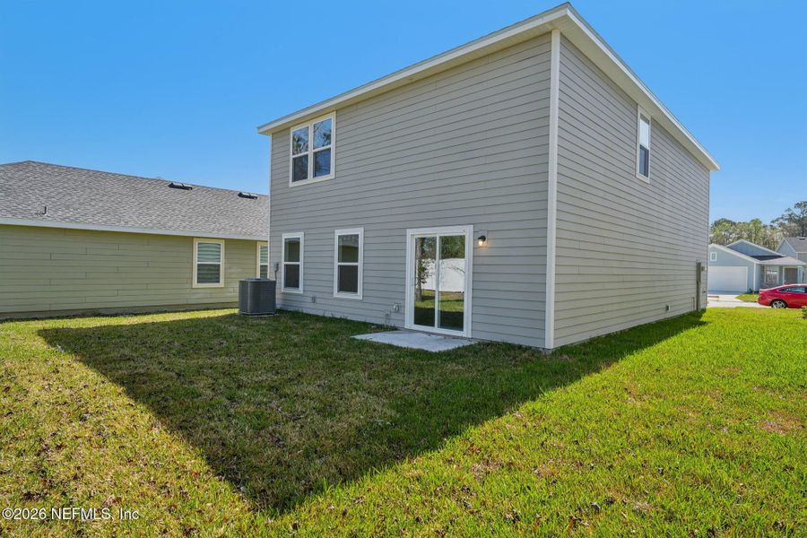 Exterior details and patio area of a home in Kings Landing, Jacksonville (Image 29).