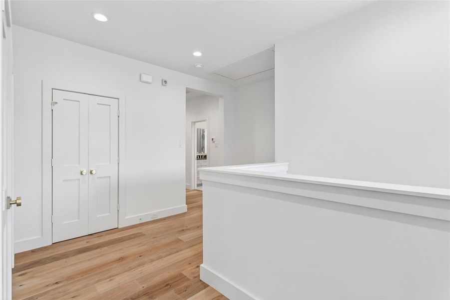 Upstairs hallway with linen closet