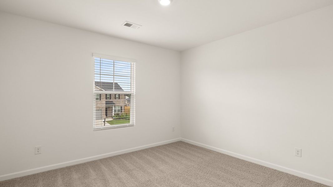 Representative unfurnished interior of a home built from the Hanover by D.R. Horton in The Reserve at Calcutta, Stockbridge (Image 19).