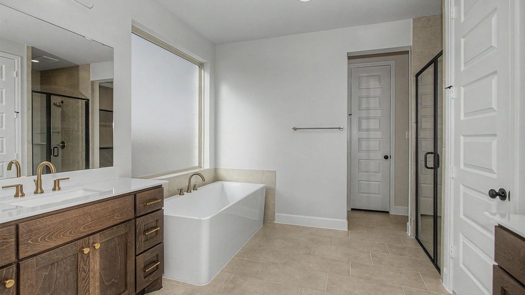 Furnished interior view inside a new home in Meridiana, Manvel (Image 5).